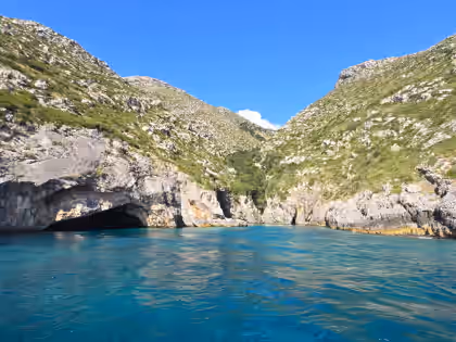 Wide blue bay and rocky Karaburun coastline on a Dhermi boat tour